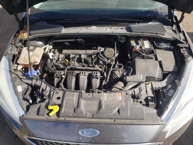 Photo 11 from auction – 2015 FORD FOCUS SE with VIN 1FADP3F25FL249964