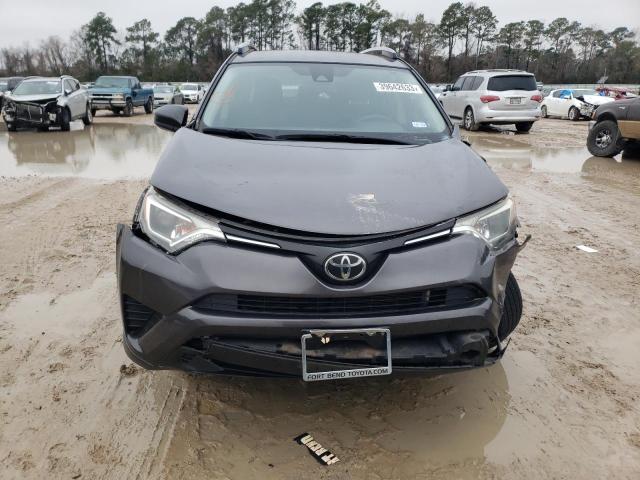 Photo 5 from auction – 2018 TOYOTA RAV4 LE with VIN JTMZFREV2JJ746704