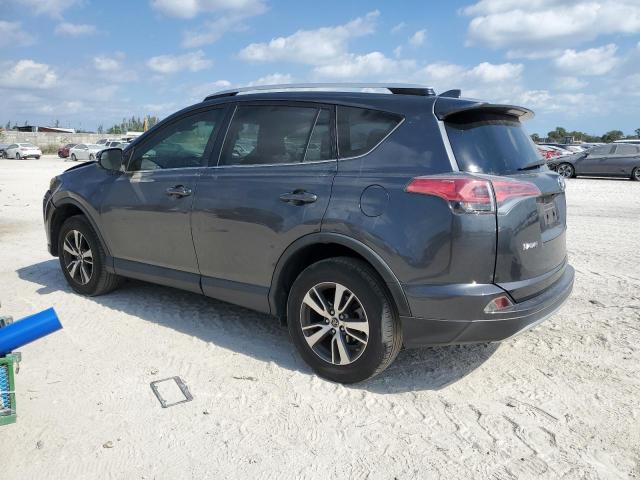 Photo 2 from auction – 2016 TOYOTA RAV4 XLE with VIN JTMWFREV5GJ067263
