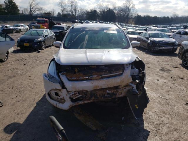 Photo 5 from auction – 2015 FORD ESCAPE TIT with VIN 1FMCU0J95FUB10912