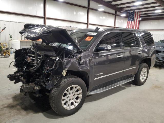 GMC YUKON SLE 2015 with VIN 1GKS1AKC7FR677056 - Photo from auction