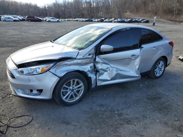 FORD FOCUS SE 2018 with VIN 1FADP3F27JL279766 - Photo from auction