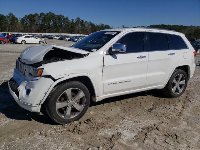 JEEP GRAND CHER 2014 with VIN 1C4RJECT9EC273063 - Photo from auction