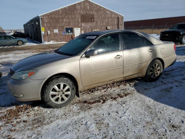 TOYOTA CAMRY LE 2004 with VIN 4T1BE30K34U863768 - Photo from auction