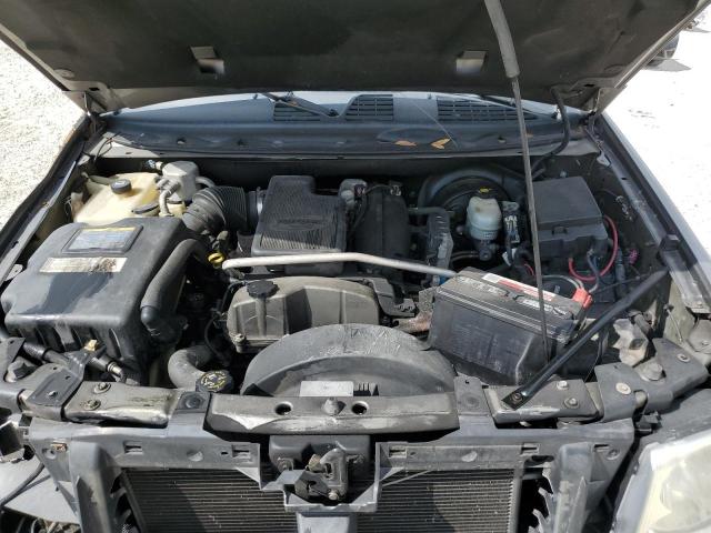 Photo 12 from auction – 2006 GMC ENVOY with VIN 1GKDS13S462140973