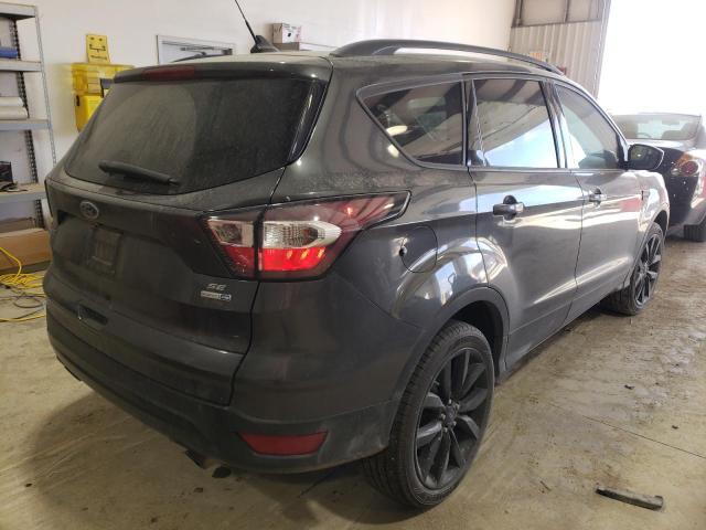 Photo 3 from auction – 2018 FORD ESCAPE SE with VIN 1FMCU9GDXJUC17267