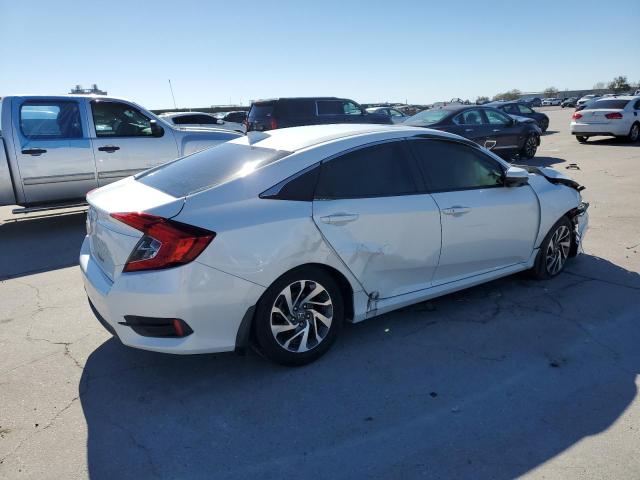 Photo 3 from auction – 2018 HONDA CIVIC EX with VIN 19XFC2F74JE033593