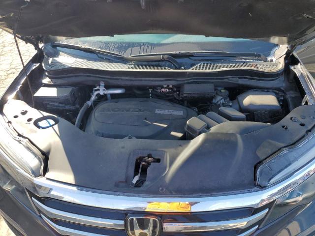 Photo 12 from auction – 2018 HONDA PILOT ELIT with VIN 5FNYF6H06JB067441