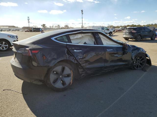 Photo 3 from auction – 2019 TESLA MODEL 3 with VIN 5YJ3E1EB8KF384354