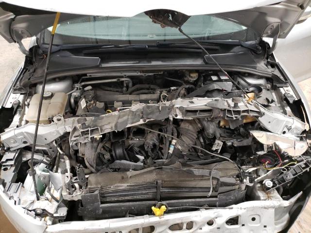 Photo 11 from auction – 2013 FORD FOCUS SE with VIN 1FADP3F25DL130020