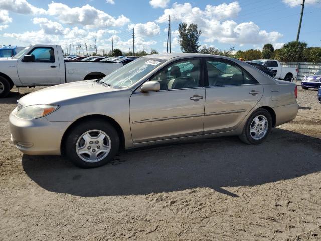 TOYOTA CAMRY LE 2002 with VIN 4T1BF32KX2U517708 - Photo from auction
