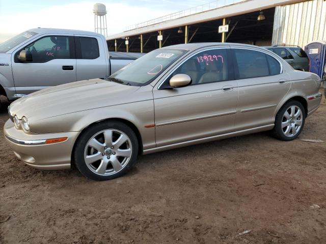 JAGUAR X-TYPE 3.0 2004 with VIN SAJEA51C24WD65473 - Photo from auction