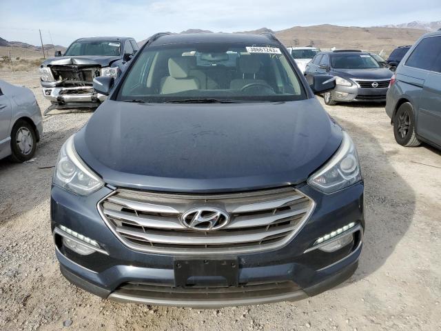 Photo 5 from auction – 2018 HYUNDAI SANTA FE S with VIN 5NMZU3LB1JH053138