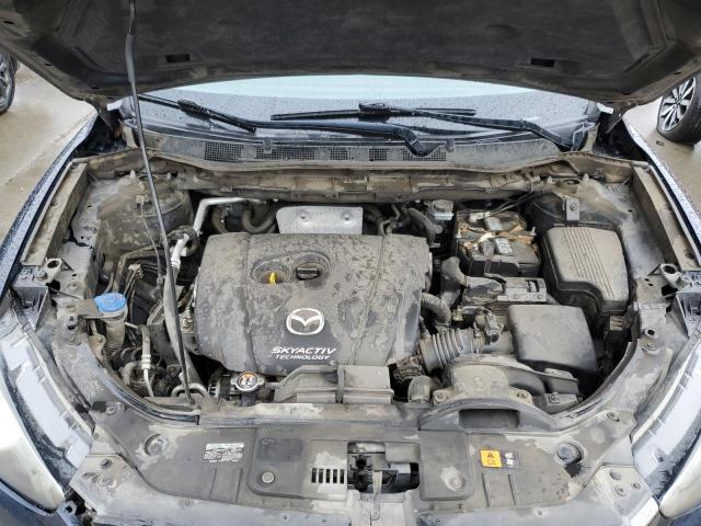 Photo 11 from auction – 2015 MAZDA CX-5 SPORT with VIN JM3KE2BE1F0496943