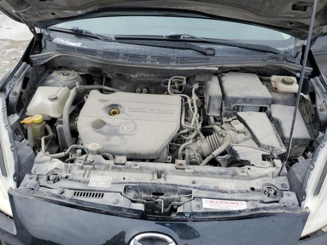 Photo 12 from auction – 2014 MAZDA 5 SPORT with VIN JM1CW2BLXE0169979