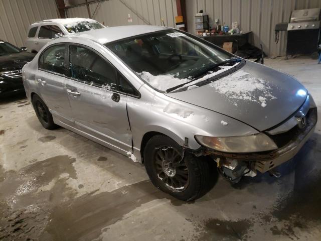 Photo 4 from auction – 2011 HONDA CIVIC LX with VIN 19XFA1F5XBE030651