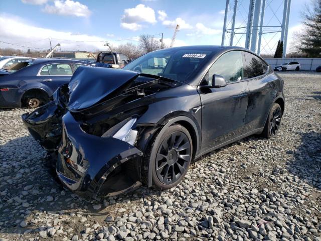 TESLA MODEL Y 2021 with VIN 5YJYGDEE6MF064903 - Photo from auction