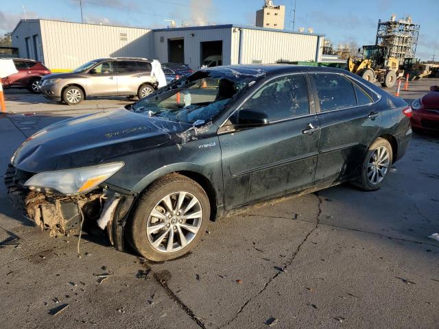 TOYOTA CAMRY HYBR 2016 with VIN 4T1BD1FK7GU183780 - Photo from auction