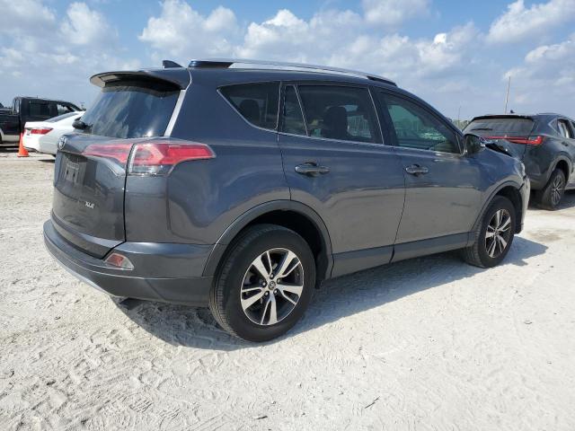Photo 3 from auction – 2016 TOYOTA RAV4 XLE with VIN JTMWFREV5GJ067263