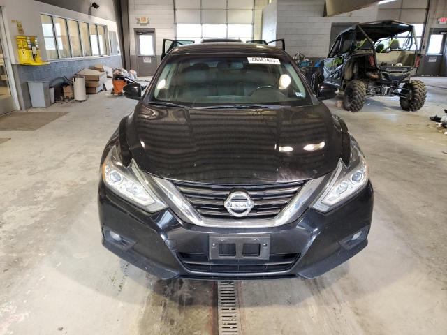 Photo 5 from auction – 2016 NISSAN ALTIMA 2.5 with VIN 1N4AL3AP9GC129569