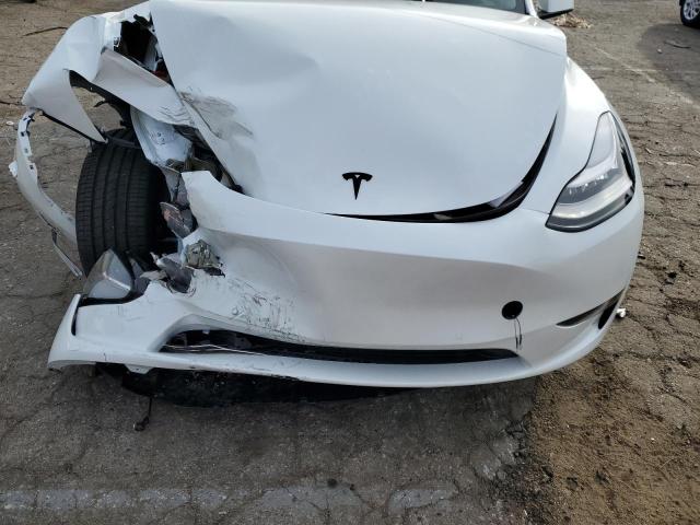 Photo 12 from auction – 2023 TESLA MODEL Y with VIN 7SAYGDEE6PF592349