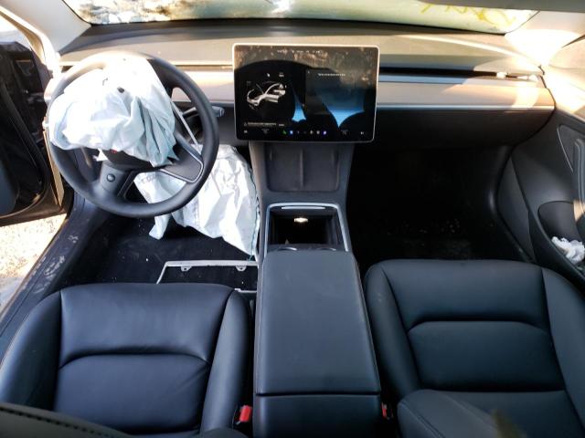 Photo 8 from auction – 2021 TESLA MODEL 3 with VIN 5YJ3E1EB7MF056314