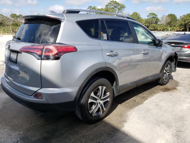 Photo 3 from auction – 2018 TOYOTA RAV4 LE with VIN 2T3ZFREVXJW509010