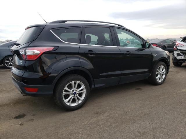 Photo 3 from auction – 2018 FORD ESCAPE SE with VIN 1FMCU0GD5JUC90137
