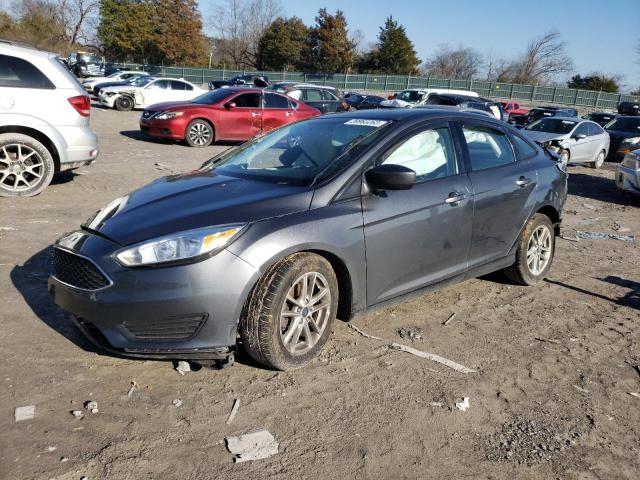 FORD FOCUS SE 2018 with VIN 1FADP3F21JL208692 - Photo from auction