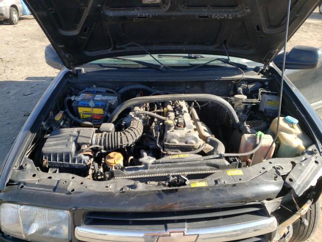 Photo 12 from auction – 2000 CHEVROLET TRACKER with VIN 2CNBJ13C3Y6935058