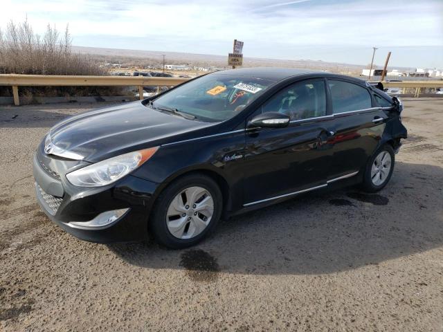 HYUNDAI SONATA HYB 2014 with VIN KMHEC4A44EA113985 - Photo from auction