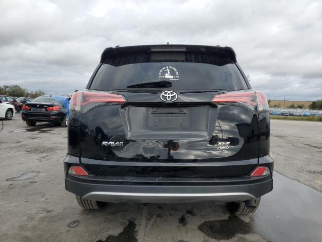Photo 6 from auction – 2017 TOYOTA RAV4 XLE with VIN 2T3RFREV4HW594727
