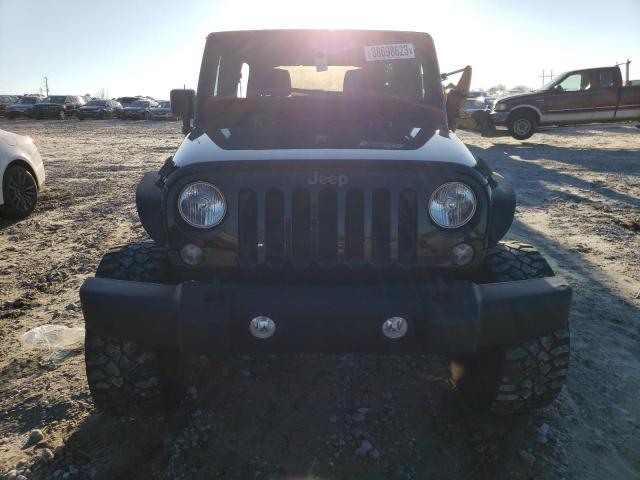 Photo 5 from auction – 2015 JEEP WRANGLER U with VIN 1C4BJWDG6FL503572