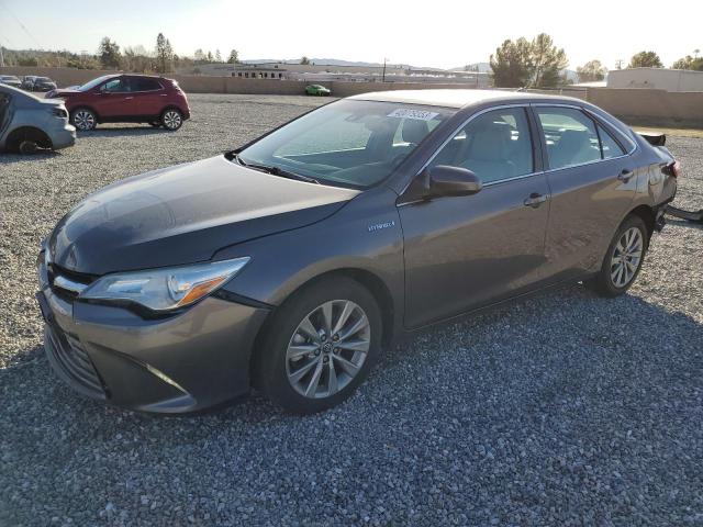 TOYOTA CAMRY HYBR 2016 with VIN 4T1BD1FK3GU190306 - Photo from auction