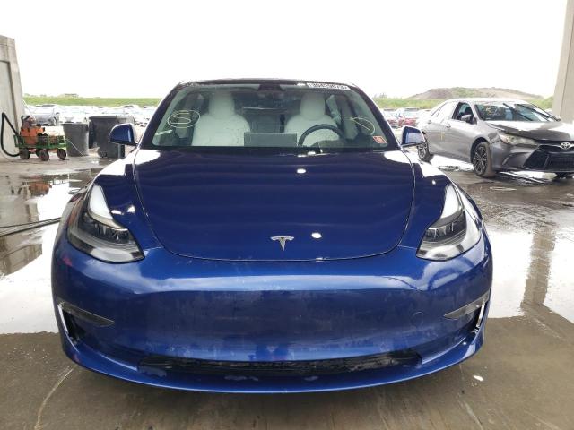 Photo 5 from auction – 2021 TESLA MODEL 3 with VIN 5YJ3E1EC3MF984551