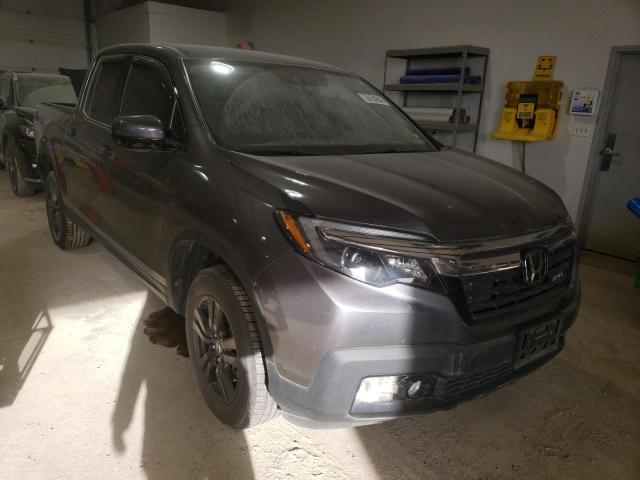 Photo 4 from auction – 2020 HONDA RIDGELINE with VIN 5FPYK3F12LB021573
