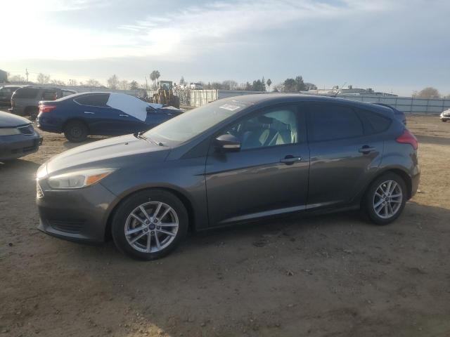 FORD FOCUS SE 2017 with VIN 1FADP3K21HL290889 - Photo from auction