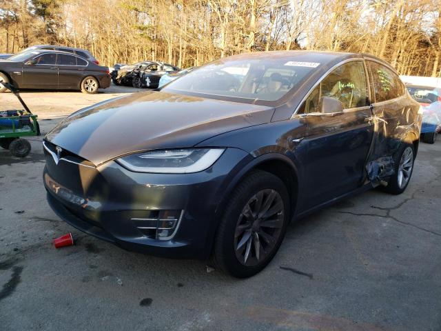 TESLA MODEL X 2018 with VIN 5YJXCDE29JF126447 - Photo from auction