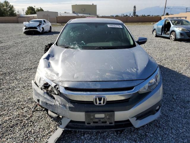 Photo 5 from auction – 2018 HONDA CIVIC EX with VIN JHMFC1F30JX040529