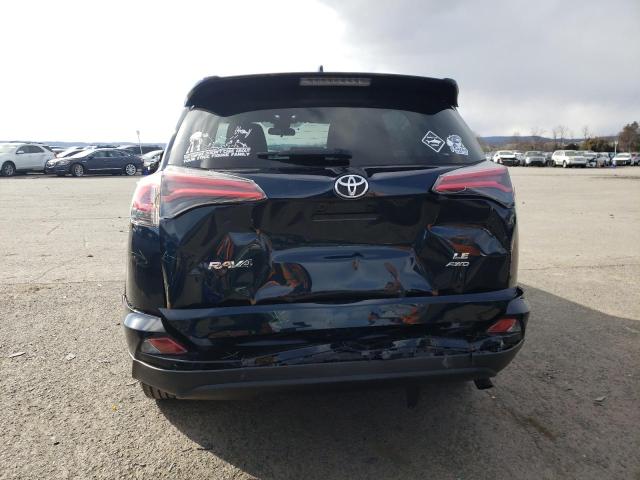 Photo 6 from auction – 2018 TOYOTA RAV4 LE with VIN JTMBFREV7JJ730287