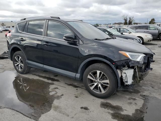 Photo 4 from auction – 2017 TOYOTA RAV4 XLE with VIN 2T3RFREV4HW594727