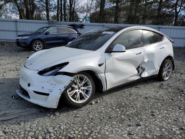 TESLA MODEL Y 2022 with VIN 7SAYGDEE3NF310519 - Photo from auction