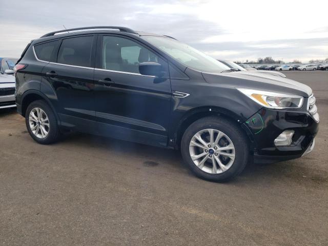 Photo 4 from auction – 2018 FORD ESCAPE SE with VIN 1FMCU0GD5JUC90137