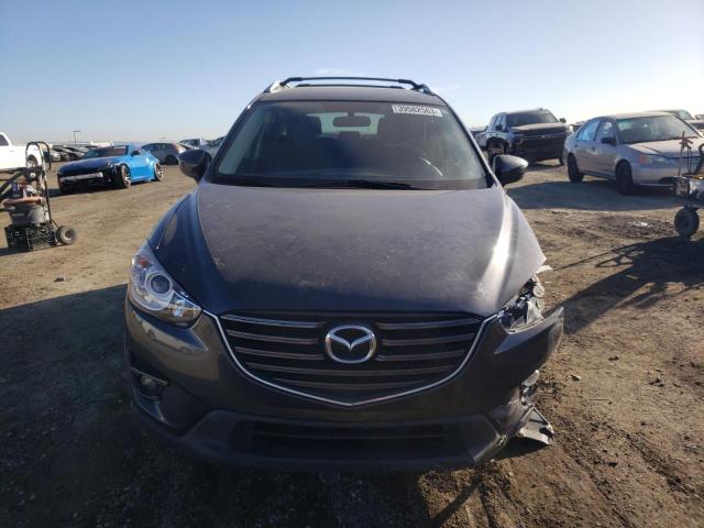 Photo 5 from auction – 2016 MAZDA CX-5 TOURI with VIN JM3KE4CY2G0895916