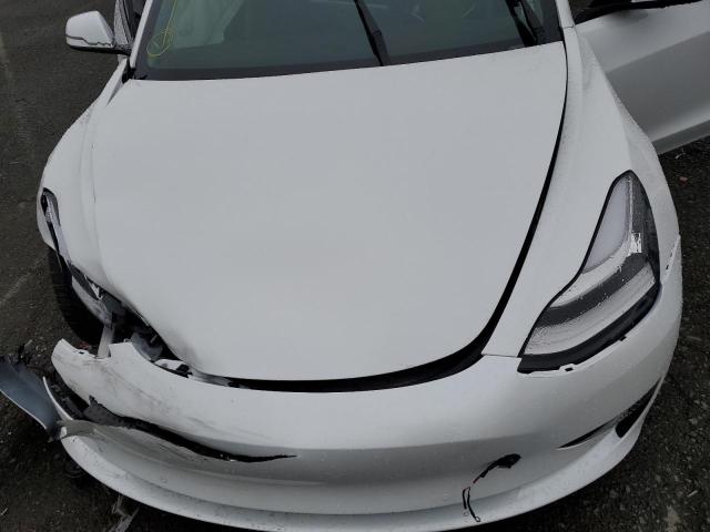 Photo 11 from auction – 2022 TESLA MODEL 3 with VIN 5YJ3E1EB1NF296055