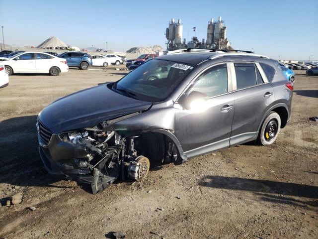 MAZDA CX-5 TOURI 2016 with VIN JM3KE4CY2G0895916 - Photo from auction