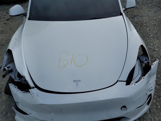 Photo 11 from auction – 2022 TESLA MODEL Y with VIN 7SAYGDEE3NF310519