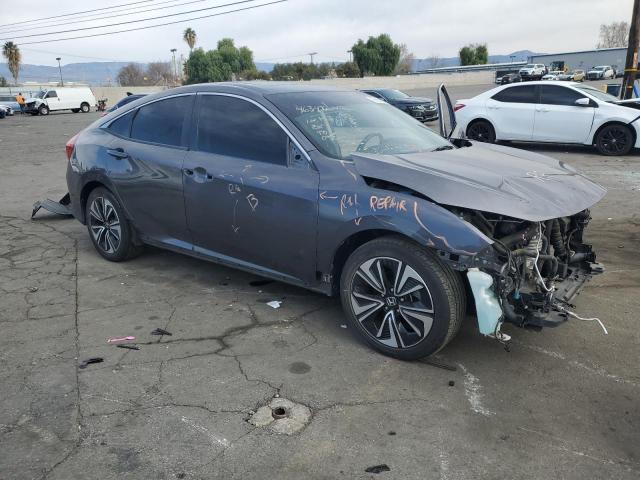 Photo 4 from auction – 2018 HONDA CIVIC EX with VIN JHMFC1F35JX008286
