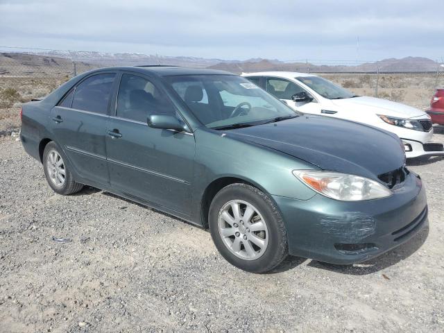Photo 4 from auction – 2002 TOYOTA CAMRY LE with VIN JTDBE32K520070896
