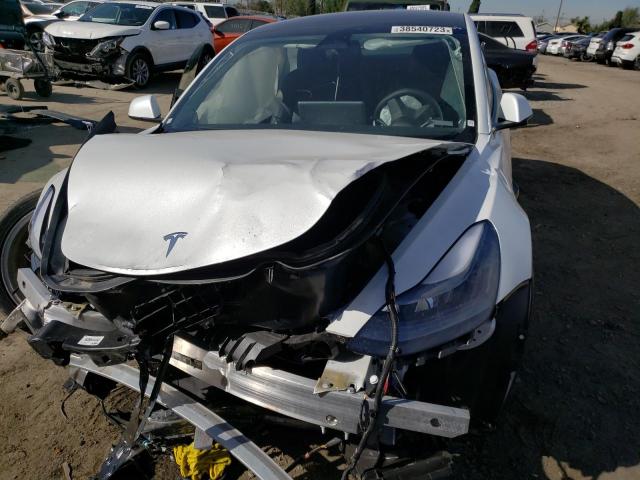 Photo 5 from auction – 2022 TESLA MODEL 3 with VIN 5YJ3E1EAXNF290097